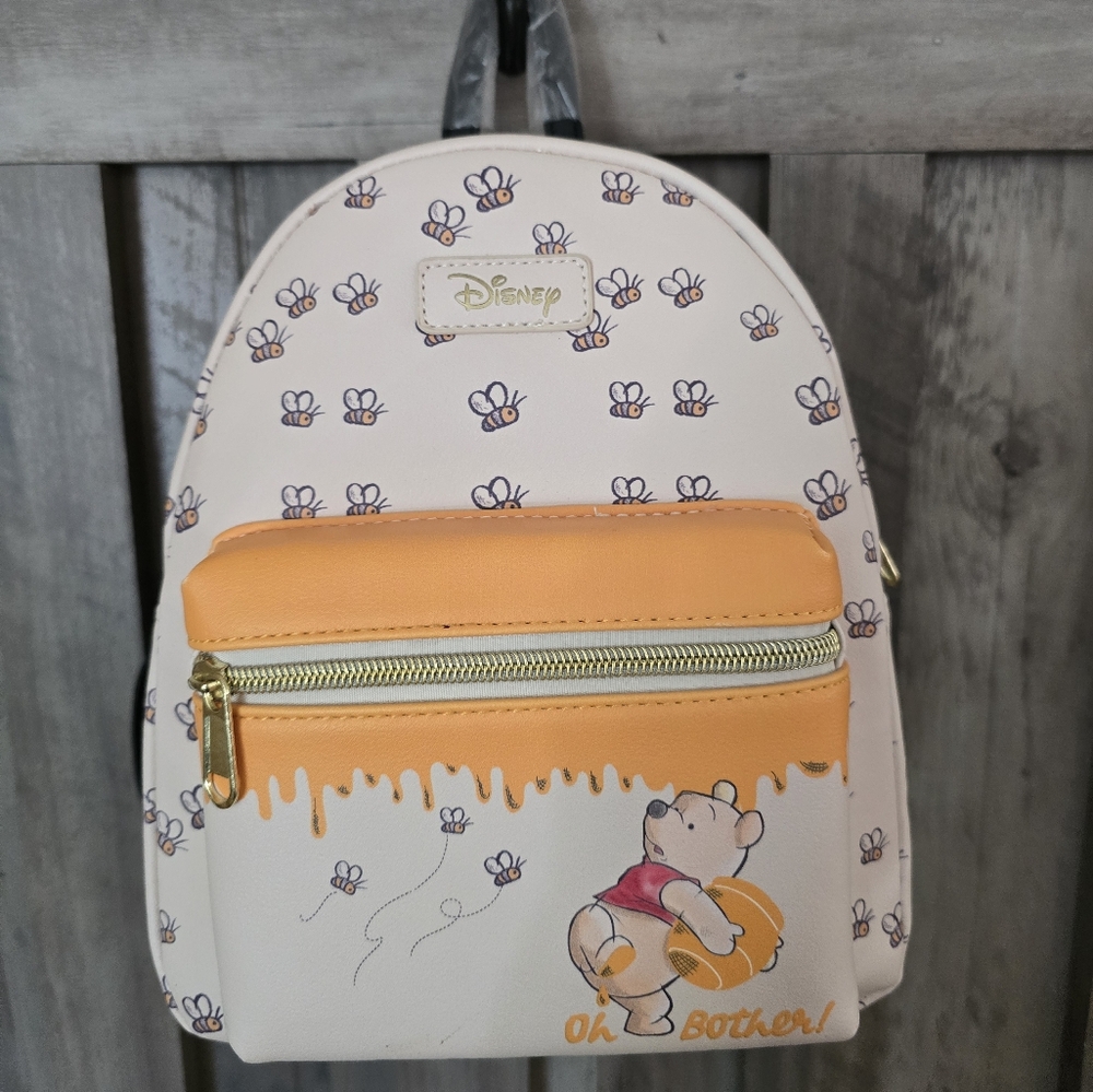 Disney Cream and Orange Pooh Bear Kids Backpack 9 X 5 X 10.5.  Brand New.